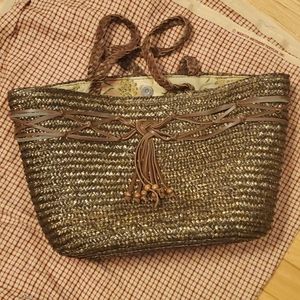 straw bag with leather bow